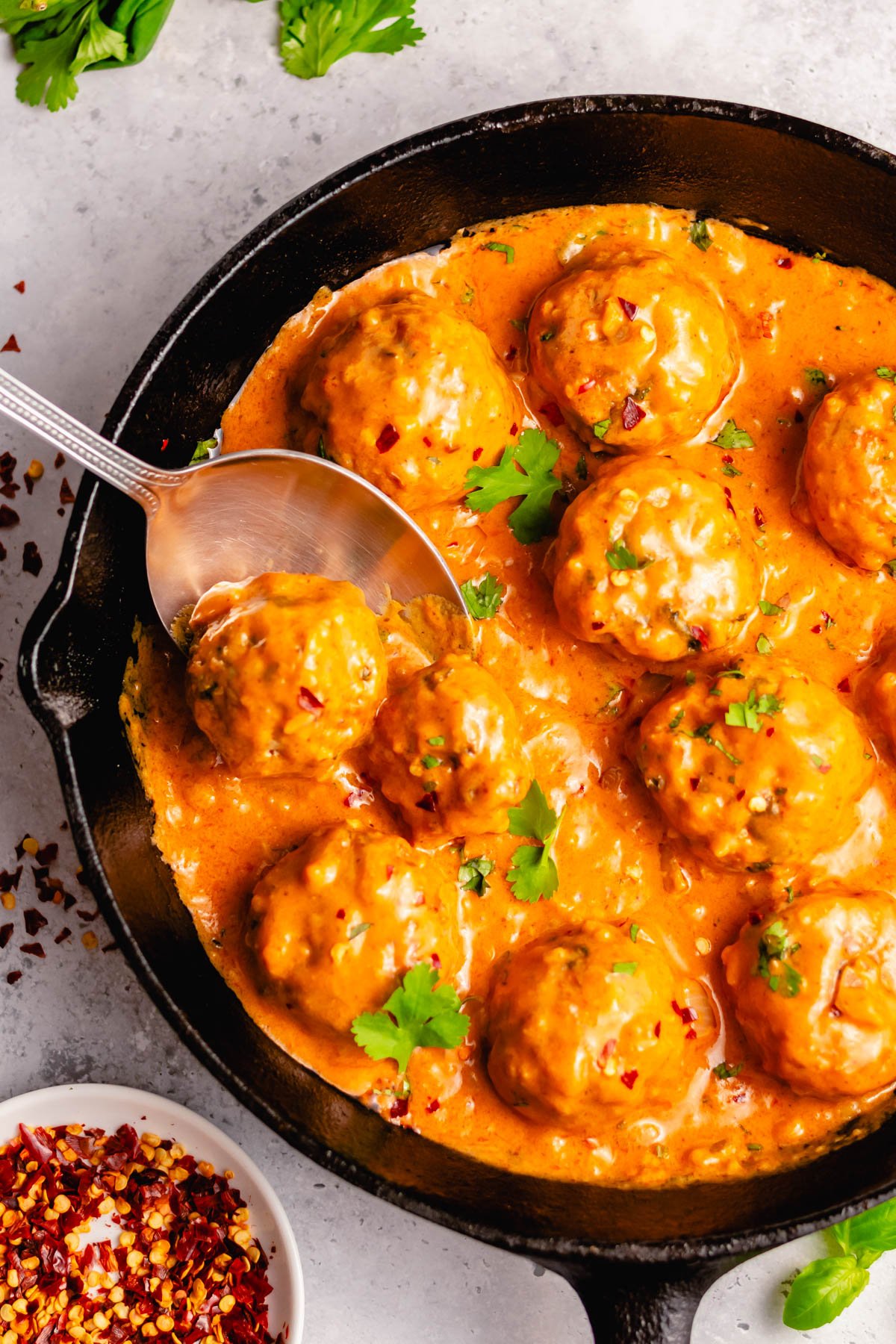 These Whole30 curry chicken meatballs are the perfect weeknight dinner recipe. Made on the stovetop, these gluten free ground chicken meatballs are dairy free, low carb and are done in one skillet. If you're looking for a dinner that is both healthy and delicious while keeping your cleanup to a minimum, give this curry chicken meatball recipe a go! #chickenmeatballs #glutenfreerecipes #dairyfreerecipes #whole30chicken