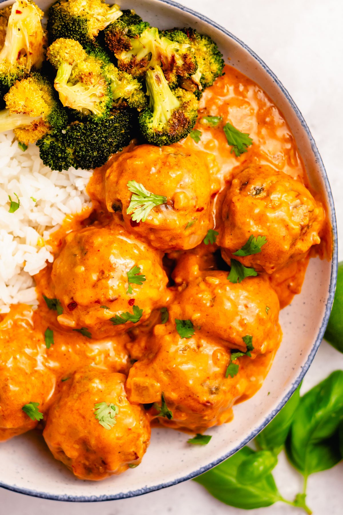 These Whole30 curry chicken meatballs are the perfect weeknight dinner recipe. Made on the stovetop, these gluten free ground chicken meatballs are dairy free, low carb and are done in one skillet. If you're looking for a dinner that is both healthy and delicious while keeping your cleanup to a minimum, give this curry chicken meatball recipe a go! #chickenmeatballs #glutenfreerecipes #dairyfreerecipes #whole30chicken