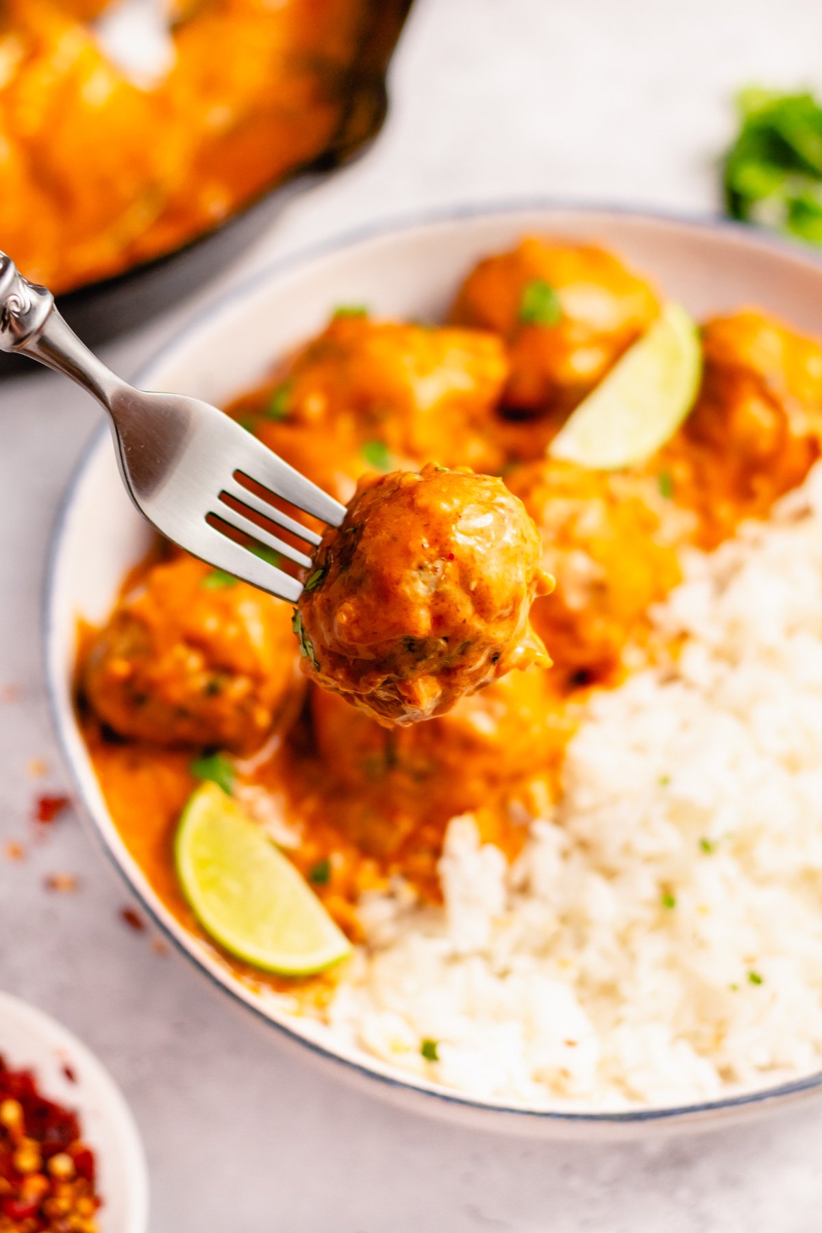 These Whole30 curry chicken meatballs are the perfect weeknight dinner recipe. Made on the stovetop, these gluten free ground chicken meatballs are dairy free, low carb and are done in one skillet. If you're looking for a dinner that is both healthy and delicious while keeping your cleanup to a minimum, give this curry chicken meatball recipe a go! #chickenmeatballs #glutenfreerecipes #dairyfreerecipes #whole30chicken