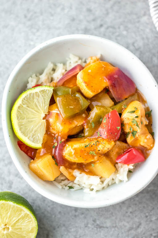 This Whole30 instant pot Hawaiian BBQ chicken recipe is so easy and quick and requires very little prep time. It all comes together in one pot in 30 minutes, and is also paleo, gluten-free and dairy-free. This Whole30 instant pot chicken breast recipe has a tangy sauce made from BBQ and pineapple that perfectly coats the bell peppers and onions and goes great mixed with rice or cauliflower rice. #whole30instantpot #instantpotchicken #glutenfreeinstantpot