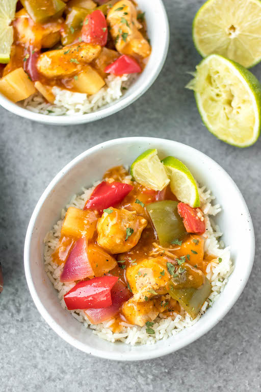 This Whole30 instant pot Hawaiian BBQ chicken recipe is so easy and quick and requires very little prep time. It all comes together in one pot in 30 minutes, and is also paleo, gluten-free and dairy-free. This Whole30 instant pot chicken breast recipe has a tangy sauce made from BBQ and pineapple that perfectly coats the bell peppers and onions and goes great mixed with rice or cauliflower rice. #whole30instantpot #instantpotchicken #glutenfreeinstantpot