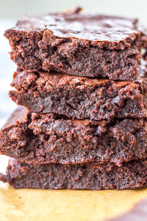 This dairy free brownies recipe is so easy to make, use oil or vegan butter, and only requires one bowl! With only a few simple ingredients, these brownies are perfectly fudgey, gooey and soft. There's an option to make your fudge brownies gluten free, too, and they make the best dessert or treat that everyone can enjoy! #dairyfreebrownies #brownieswithoutdairy #glutenfreebrownies