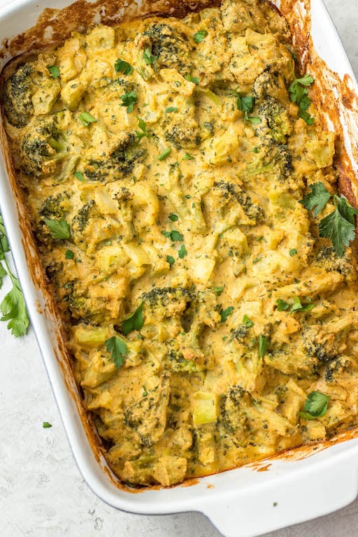 This healthy broccoli casserole recipe is perfect for an easy vegetable side dish for a weeknight dinner, or for a family holiday gathering like Easter! It's keto, Paleo, dairy free, Whole30 and vegetarian, so everyone can enjoy. It can be made with fresh broccoli, or is a great way to use frozen broccoli! The dairy free cheese sauce is quick to make, creamy and delicious! #healthybroccolicasserole #healthyeasterrecipes #dairyfree #whole30 #vegetablerecipes