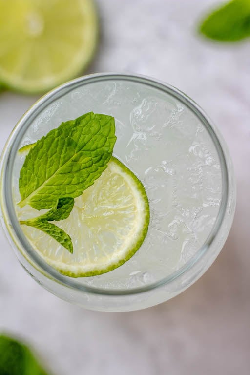 This lime juice recipe is refreshing, healthy and perfect for spring or summer! Known as limeade, this drink only uses a few simple ingredients, and can be made with fresh lime juice or bottled, sweetened or unsweetened! You'll love having this lime drink ready to go in the fridge to make drinking water more fun! #limejuice #limeade #limejuicerecipes #whole30drinks This lime juice recipe is refreshing, healthy and perfect for spring or summer! Known as limeade, this drink only uses a few simple ingredients, and can be made with fresh lime juice or bottled, sweetened or unsweetened! You'll love having this lime drink ready to go in the fridge to make drinking water more fun! #limejuice #limeade #limejuicerecipes #whole30drinks