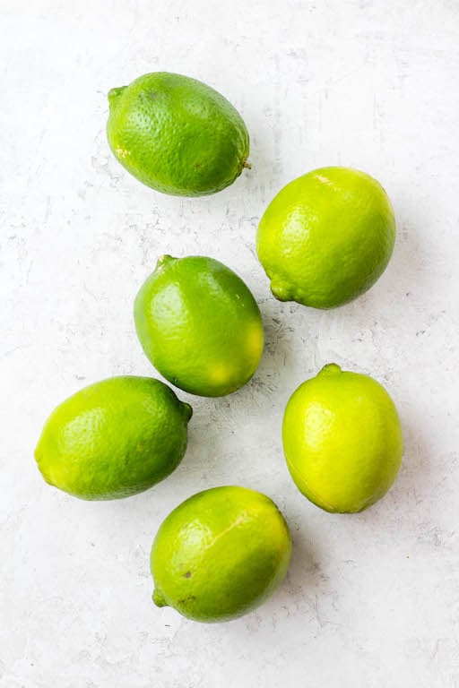 This lime juice recipe is refreshing, healthy and perfect for spring or summer! Known as limeade, this drink only uses a few simple ingredients, and can be made with fresh lime juice or bottled, sweetened or unsweetened! You'll love having this lime drink ready to go in the fridge to make drinking water more fun! #limejuice #limeade #limejuicerecipes #whole30drinks