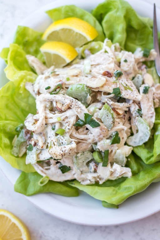 This easy shredded chicken salad recipe is so easy to make, and a great way to use leftover chicken or rotisserie chicken. It's made in under 20 minutes, with fewer than 10 ingredients and is awesome for lunch meal prep or shredded chicken salads. This salad is also Whole30, gluten free, dairy free, paleo and keto. #shreddedchickensalad #whole30chickensalad