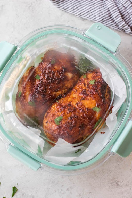 This air fryer BBQ chicken breast recipe is ideal for a quick weeknight dinner or healthy meal prep option for lunch! It's Whole30, keto and low carb, and gluten-free! It's so easy to prepare and cooks in 20 minutes. Using just a few simple ingredients, including boneless chicken breast, garlic powder and BBQ sauce, this recipe comes out juicy and perfect every time! #airfryerchicken #whole30chicken