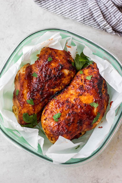 This air fryer BBQ chicken breast recipe is ideal for a quick weeknight dinner or healthy meal prep option for lunch! It's Whole30, keto and low carb, and gluten-free! It's so easy to prepare and cooks in 20 minutes. Using just a few simple ingredients, including boneless chicken breast, garlic powder and BBQ sauce, this recipe comes out juicy and perfect every time! #airfryerchicken #whole30chicken