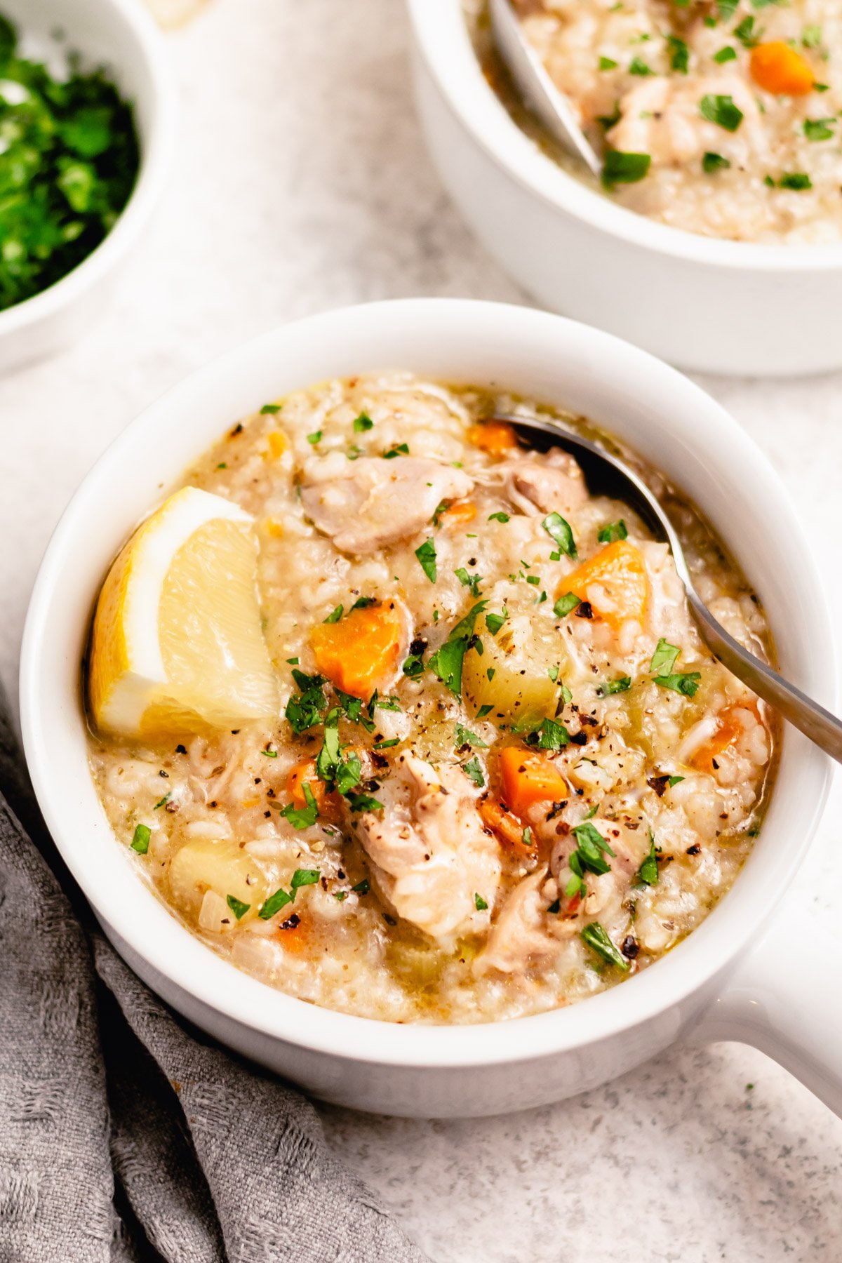 Instant pot chicken and rice soup is the perfect way to get a fulfilling, hearty soup on the table fast. It has minimal prep and is both gluten free and dairy free, and because it's done in the instant pot there's only one dish to clean. This chicken soup is perfect for a family meal on its own or a starter or side for a gathering. Plus it's ready in under 30 minutes! #glutenfreerecipes #dairyfreerecipes #healthychickenrecipes #chickensouprecipes #glutenfreedairyfreerecipes #instantpotrecipes