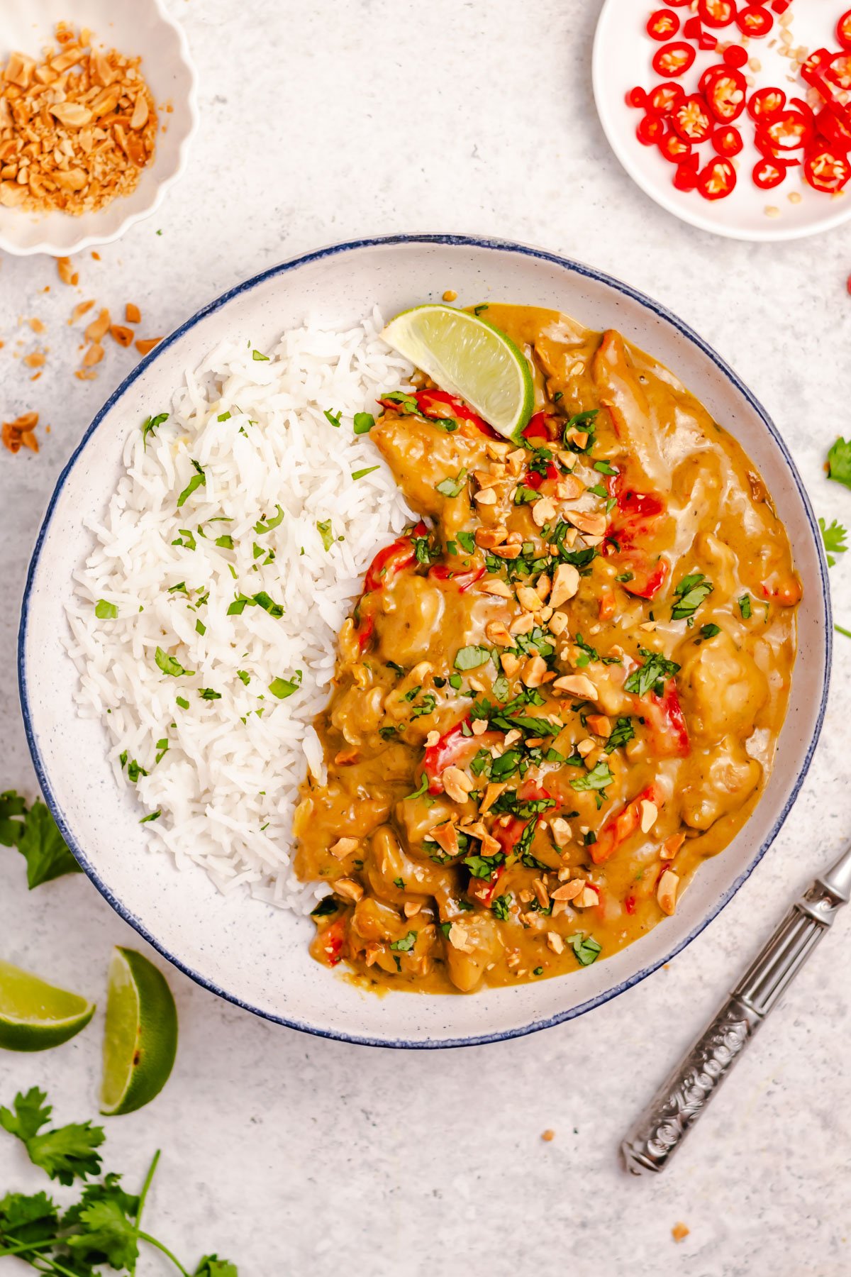 This peanut butter chicken skillet is a super easy one pot meal. It is naturally dairy free and gluten free and the combination of the spices, chicken, and peanut butter make for a hearty, fulfilling dish. It takes less than 20 minutes from start to finish for a dinner that the whole family will love! #dairyfreerecipes #glutenfreerecipes #glutenfreedairyfreerecipes #healthychickenrecipes #healthydinnerrecipes #30minutemeals