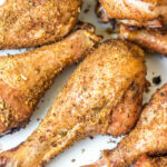 Having a go-to smoked chicken legs recipe is a must have for summer. These smoked chicken legs use very few staple ingredients and is gluten free and dairy free. It's the perfect choice for a gathering, or for meal prep because it is super easy and fast. Smoked chicken drumsticks are a favorite for kids and adults alike and will be a versatile addition to your summer smoking. #smokerrecipes #chickenlegs #glutenfreerecipes #dairyfreerecipes #smokedchickenlegs #chickendrumsticks