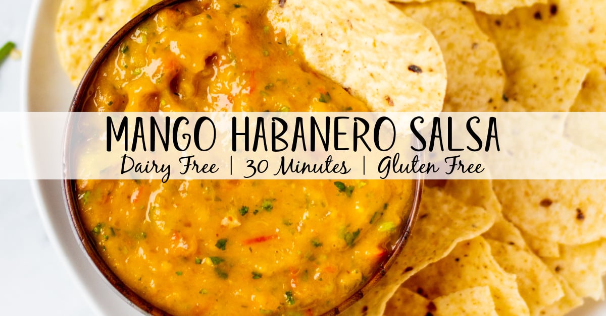 Mango habanero salsa is a great change up from a standard tomato salsa. It's gluten free and dairy free and is super simple to make with just a few easy ingredients. Plus it's paleo and Whole30 to boot! It clocks in at a total of 30 minutes to prep so it's also quick to make. This salsa is a perfect recipe to use as a dip or as a topping for tacos or anything you would want salsa for. #glutenfreerecipes #dairyfreerecipes #glutenfreedairyfreerecipes #mangosalsa #habanerosalsa