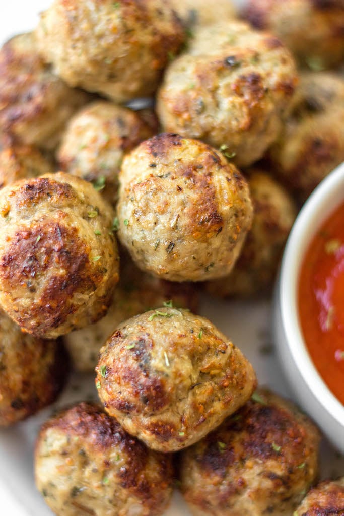 Once you make these juicy, flavorful air fryer turkey meatballs, you'll always want to keep them around! They only use a few simple ingredients and spices, 12 minutes to cook, and are a perfect protein for a huge variety of meals. Turkey meatballs in the air fryer are great for meal prep, stocking the freezer, and are gluten-free and low carb! #airfryerturkeymeatballs #turkeymeatballs #turkeymeatballsairfryer