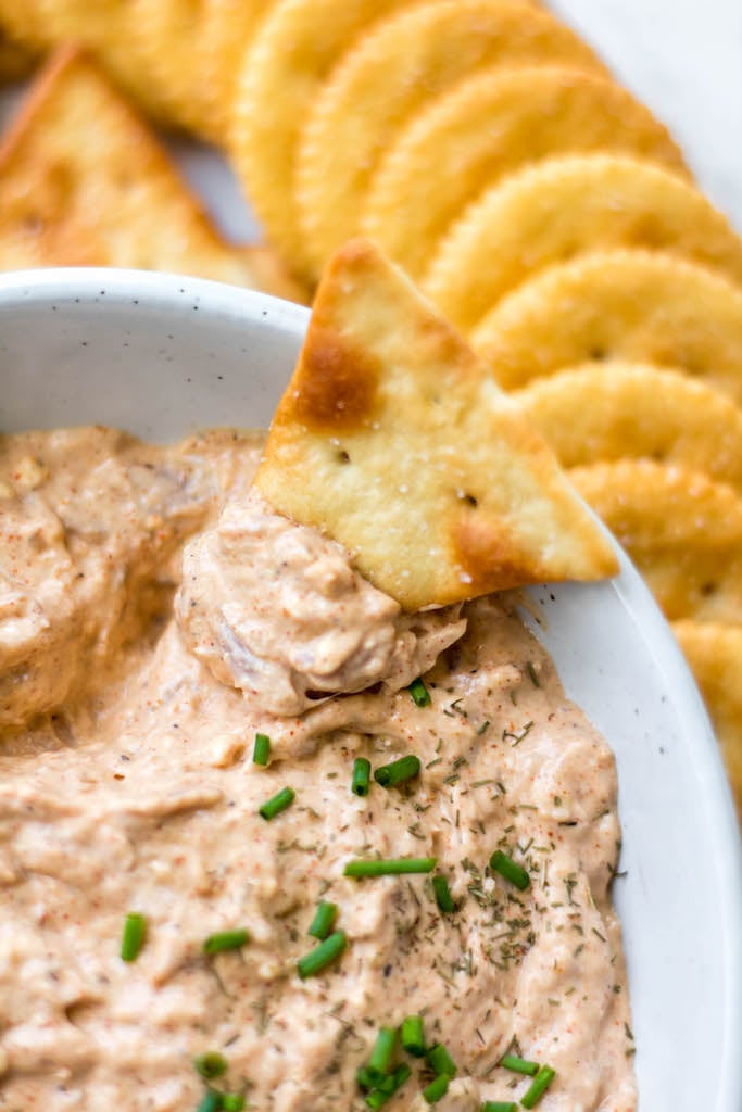 Smoked tuna dip is a super easy recipe for any sort of gathering or game day. It takes almost no time to make and is gluten free and can be made dairy free as well. A favorite of the gulf coast area, this recipe is easy to make in bulk for events with more people, or to freeze for later to have on hand. #tuna #smokedtuna #easydip #glutenfreerecipes #dairyfreerecipes #glutenfreedairyfreerecipes #fastappetizers #healthydiprecipes