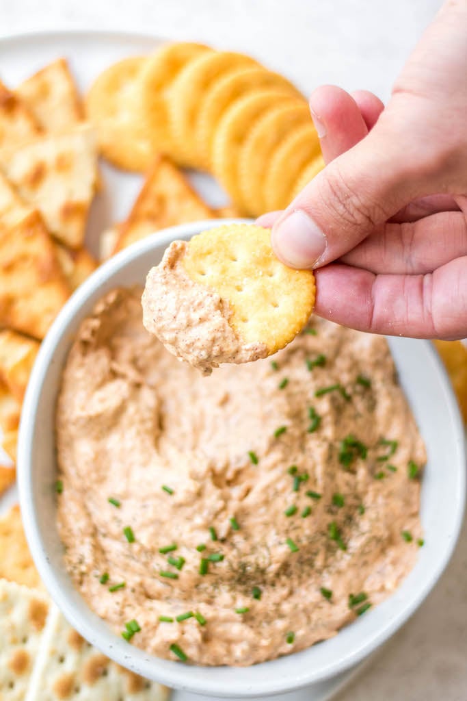 Smoked tuna dip is a super easy recipe for any sort of gathering or game day. It takes almost no time to make and is gluten free and can be made dairy free as well. A favorite of the gulf coast area, this recipe is easy to make in bulk for events with more people, or to freeze for later to have on hand. #tuna #smokedtuna #easydip #glutenfreerecipes #dairyfreerecipes #glutenfreedairyfreerecipes #fastappetizers #healthydiprecipes