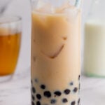 Jasmine milk boba tea is a refreshing drink that is naturally gluten free and takes only ten minutes from start to finish. It both looks great and is simple to make. The touch of sweetness from the boba (tapioca pearls) combine with the milk and floral notes of the jasmine tea make it a perfect drink for an afternoon treat or anytime. #boba #tapiocapearls #bubbletea #glutenfreerecipes #easydrinkrecipes #jasminetea #bobatea