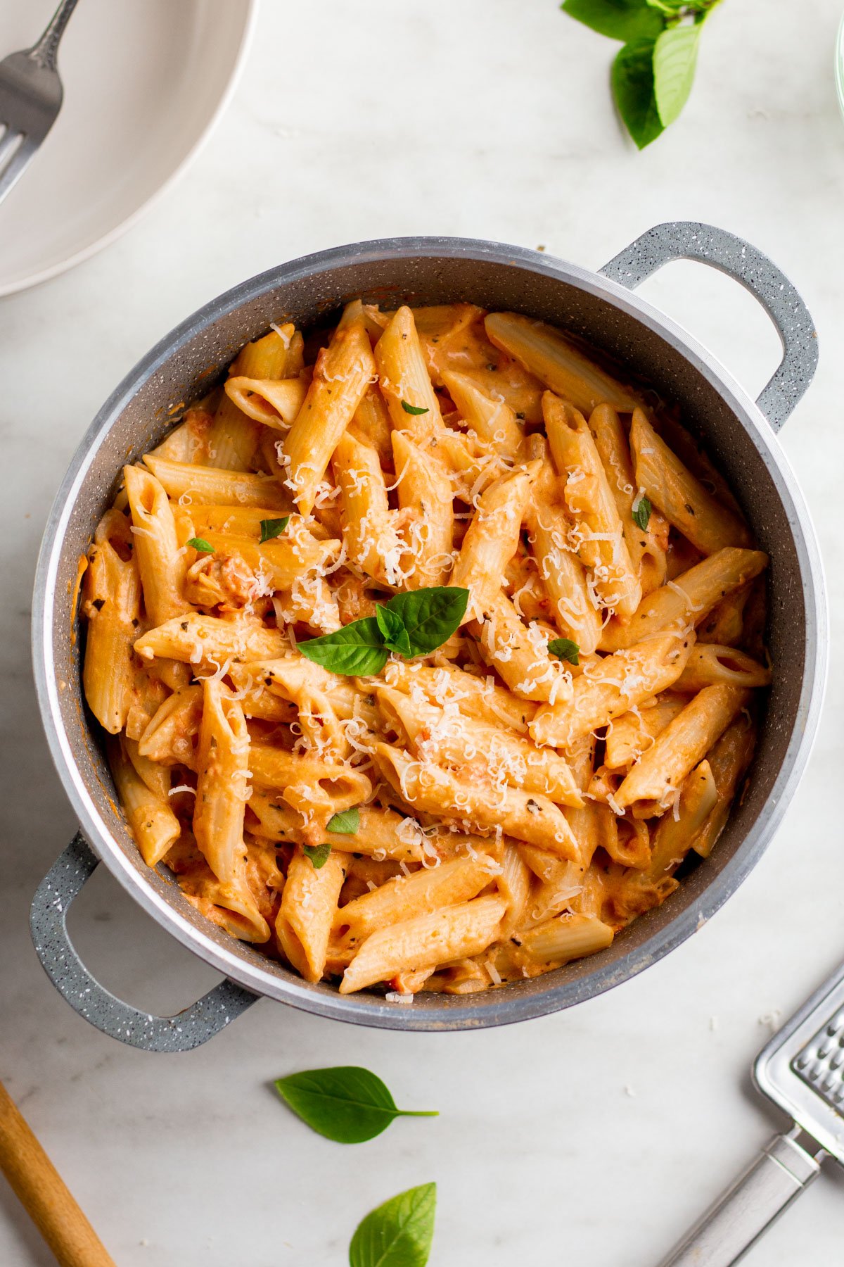 Pink sauce pasta is a simple pasta dish that is quick to make and can easily be made gluten free. This recipe is a classic and is perfect for meal prepping or a simple dinner at home. The homemade pink sauce is simple to make and can be swapped in anywhere you would normally use a pasta sauce and want the pink sauce flavor. You can even make pink sauce ahead of time and have it on hand for a pink sauce pasta later in the week. #glutenfreerecipes #pastarecipes #easydinnerrecipes #pinksaucepasta #pasta